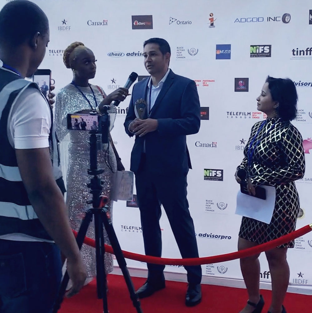 Director Edgar Garcia Chavez being interviewed at the International Black & Diversity Film Festival